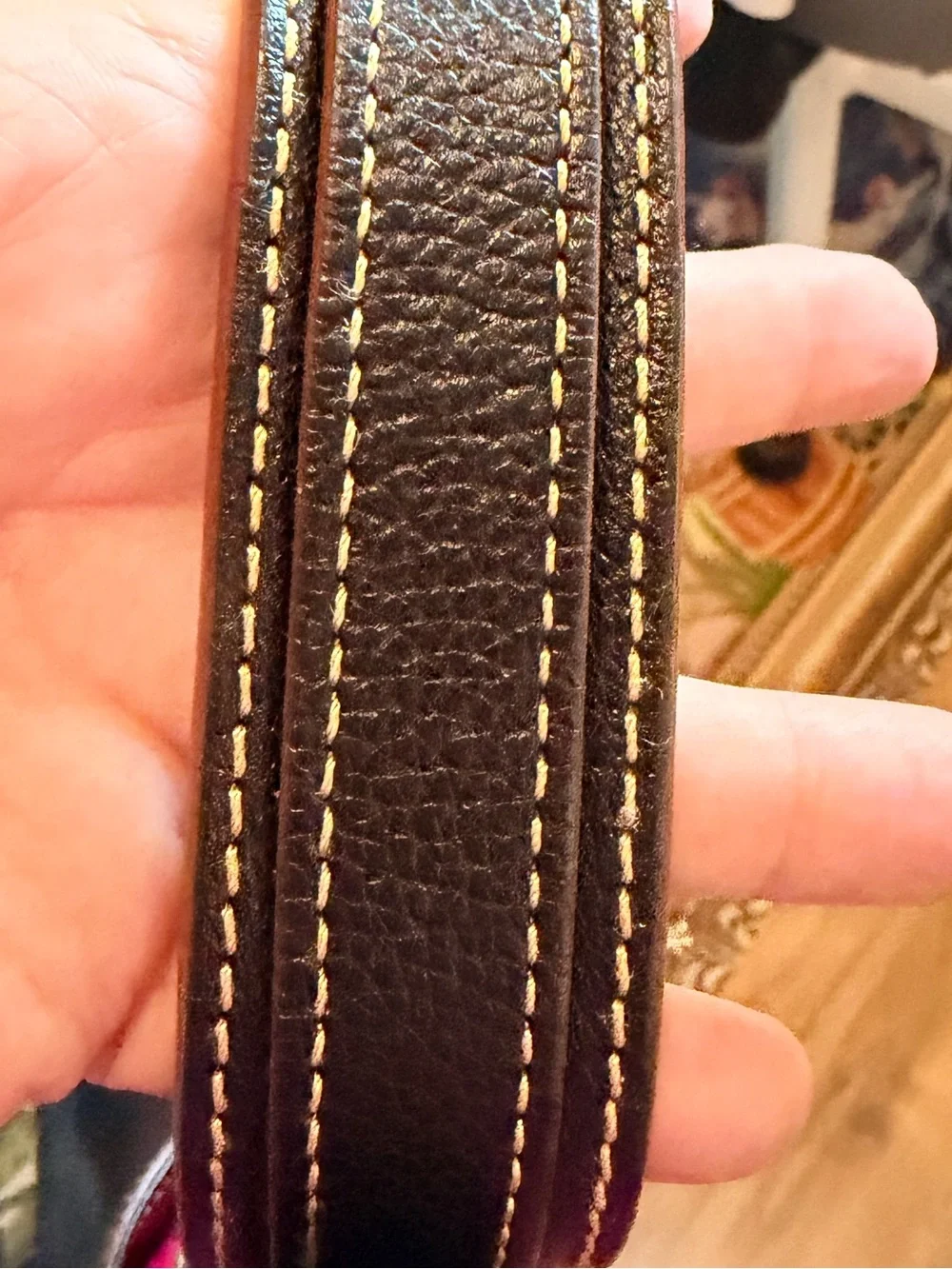 Dooney & Bourke Black Leather Shoulder Bag with Brass Hardware